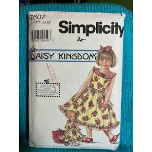 Simplicity sewing pattern  7607 girls dress 17" doll dress Daisy kingdom